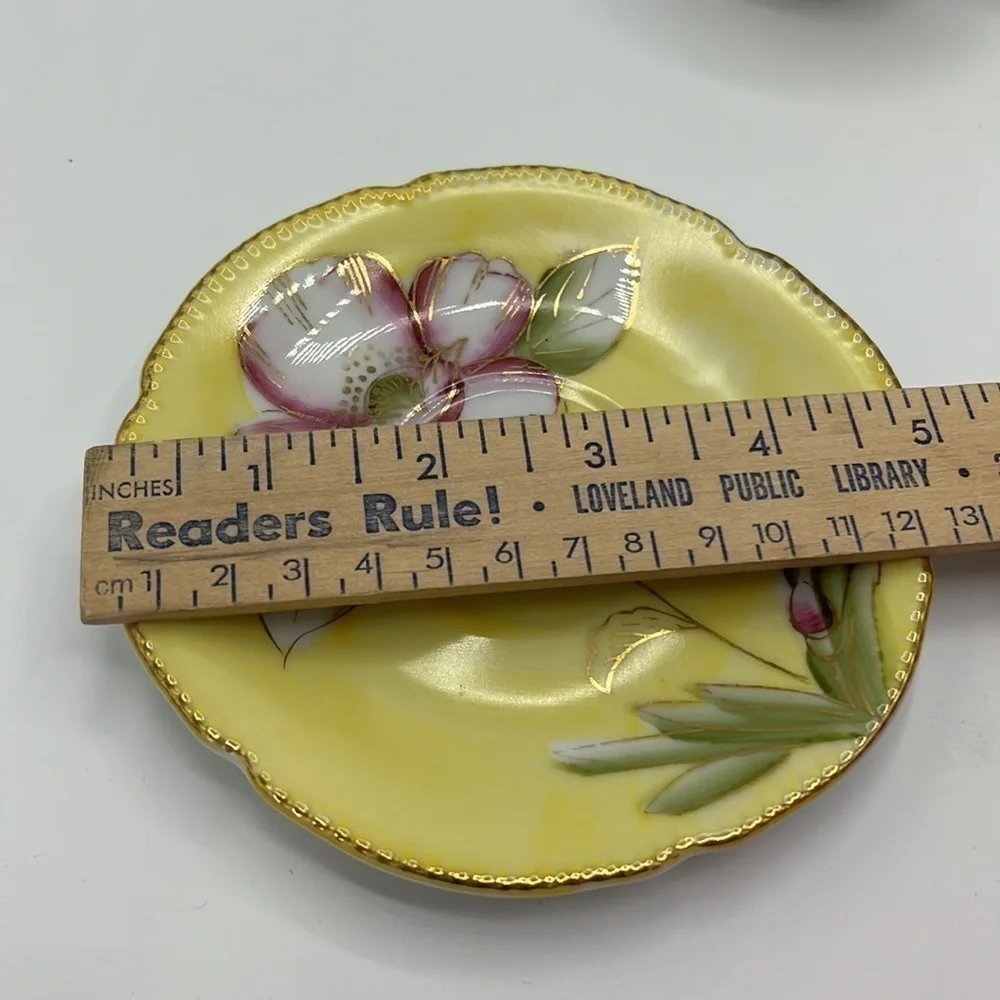 VINTAGE DAINTY LITTLE YELLOW AND PINK FLORAL TEACUP AND SAUCER